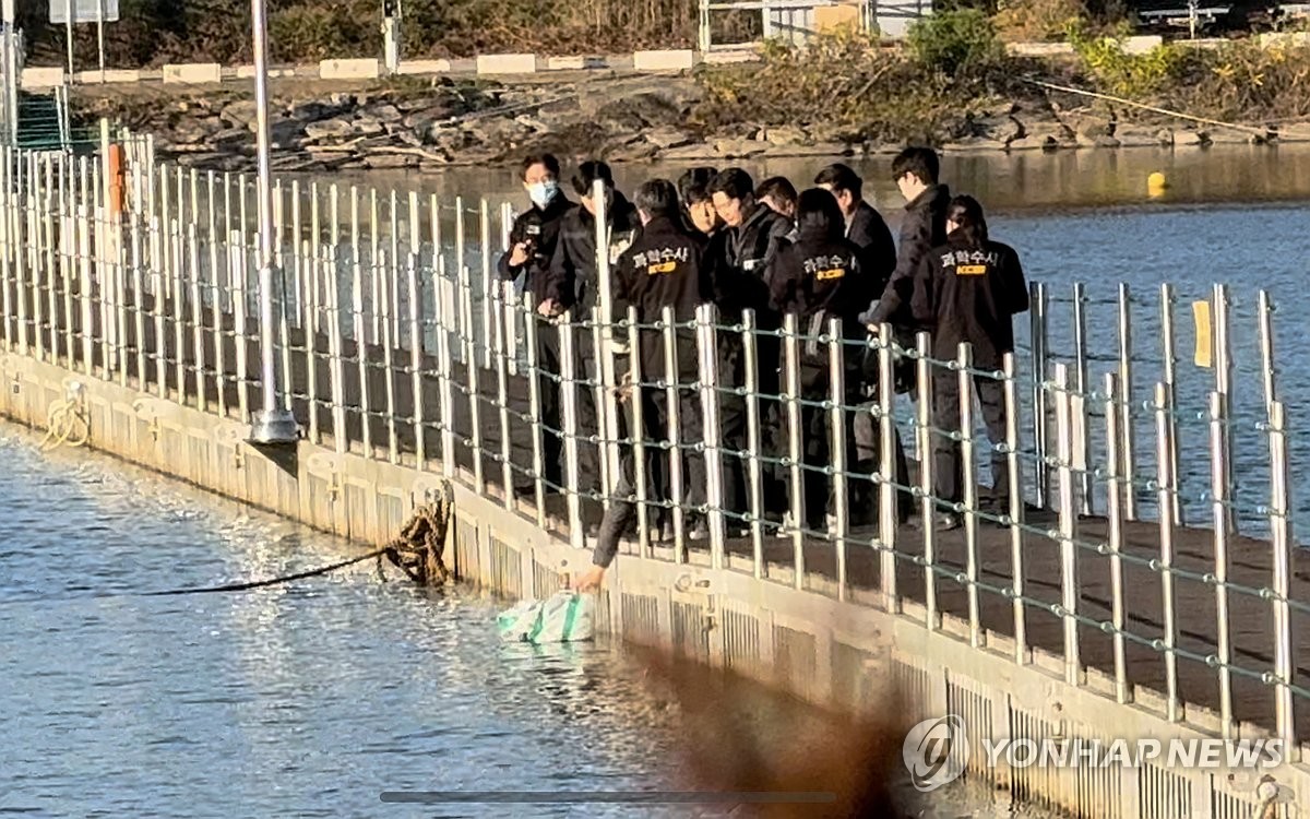 '훼손 시신' 북한강 유기한 군 장교 현장검증